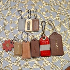 8 Coach purse tags.
